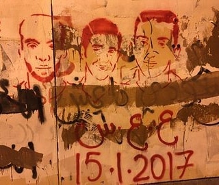 Under the Slogan “For Your blood , We will Avenge”, Walls of Karzakan and Ma’amer Decorated with Pictures of Bahrain Martyrs