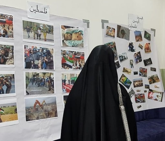 Opposed revolutionary powers organize photo gallery documenting crimes of Zionists and al-Saud